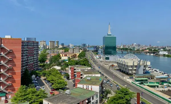 Commercial towers and waterfront district of Lagos in daylight.